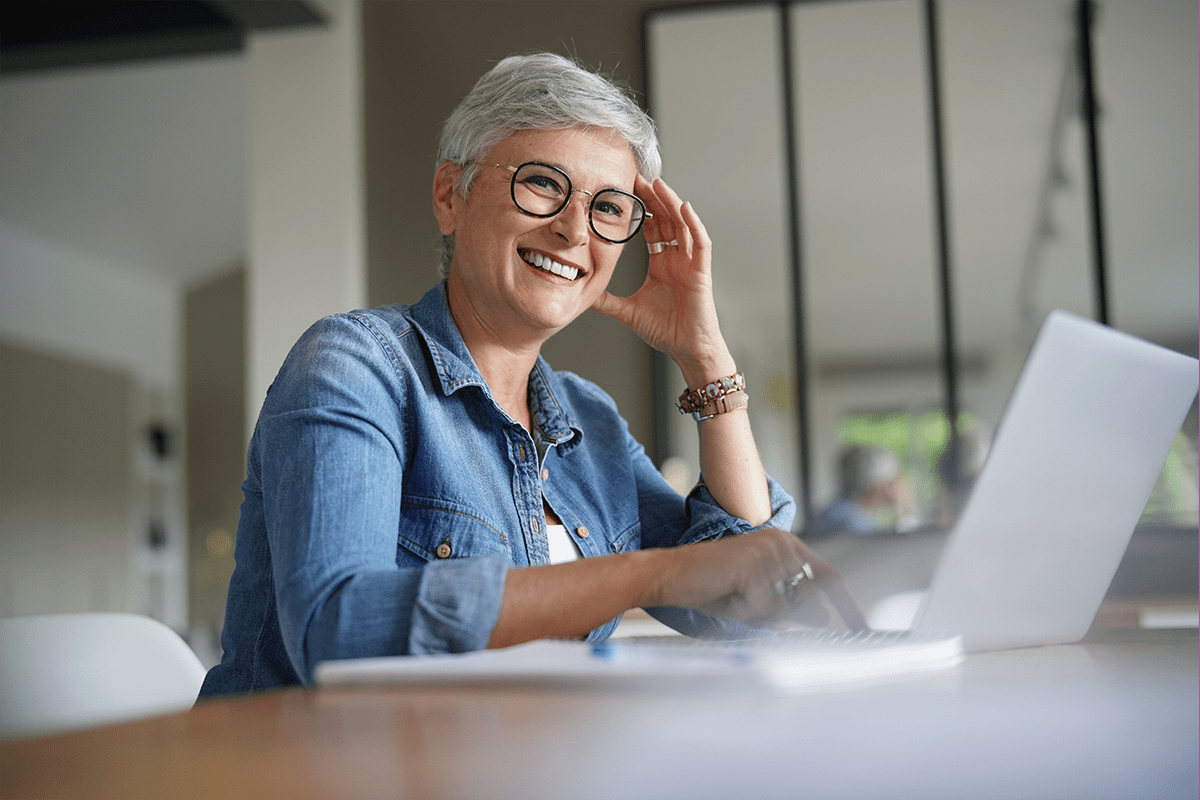 employee benefits management - employee on laptop
