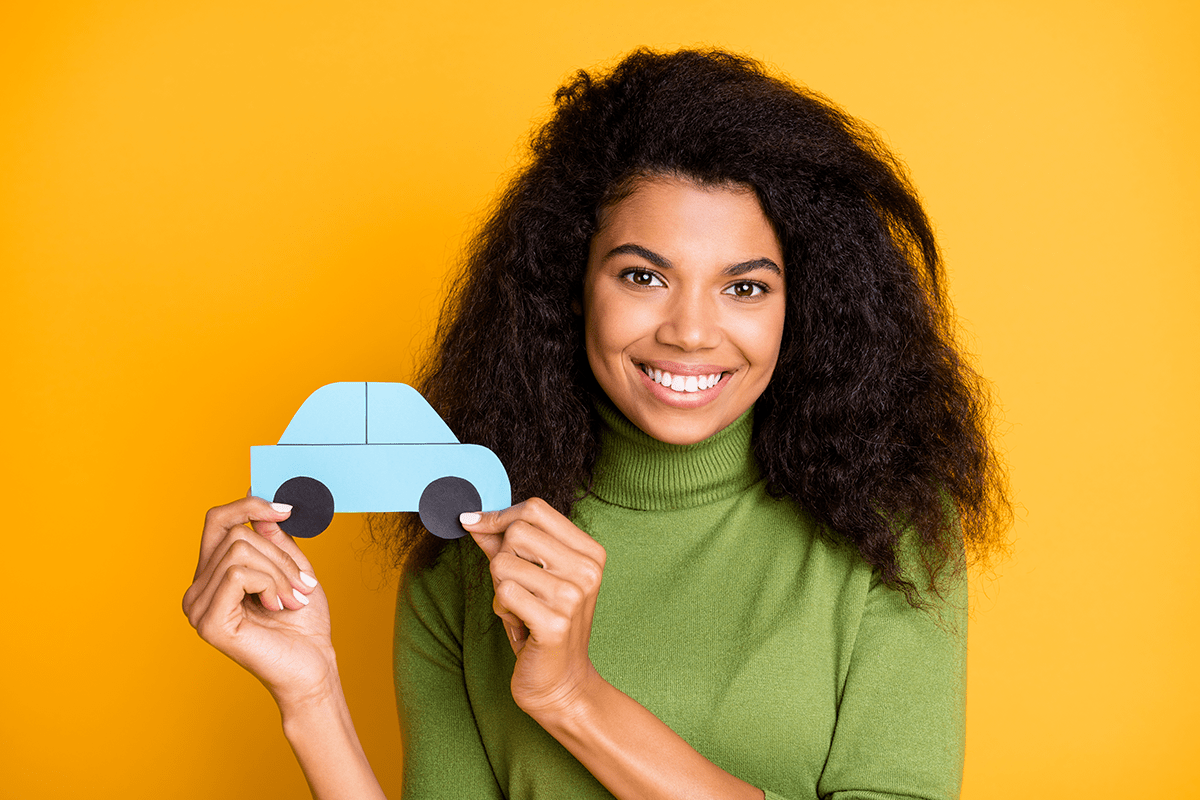 car benefit - smiling employee with car